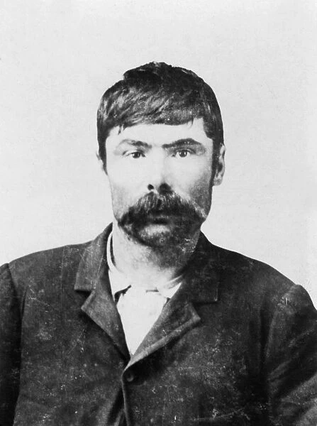 JOE CHANCELLOR, c1900. A head-and-shoulders portrait of Tom O Day, alias Joe Chancellor, a member of the Hole in the Wall gang, operating in the Wild West. Photograph, c1900
