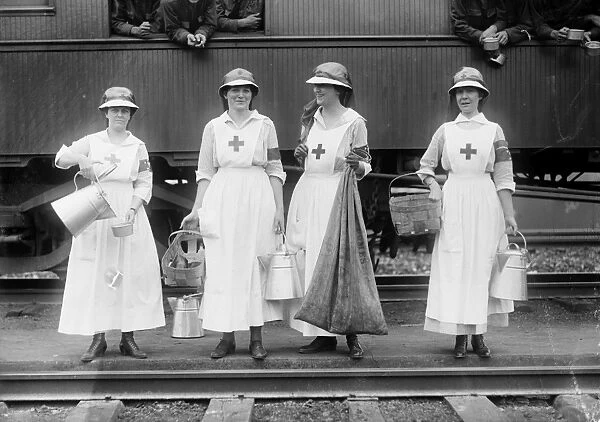 RED CROSS, c1918. American Red Cross workers near train, c1918
