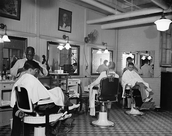 SENATE BARBER SHOP, 1937. Three senators recieving haircuts from African American