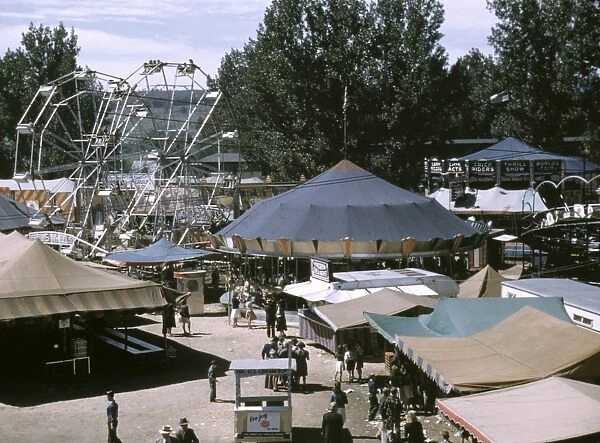VERMONT STATE FAIR, 1941. Aerial view of the ferris wheel, carousel and side show