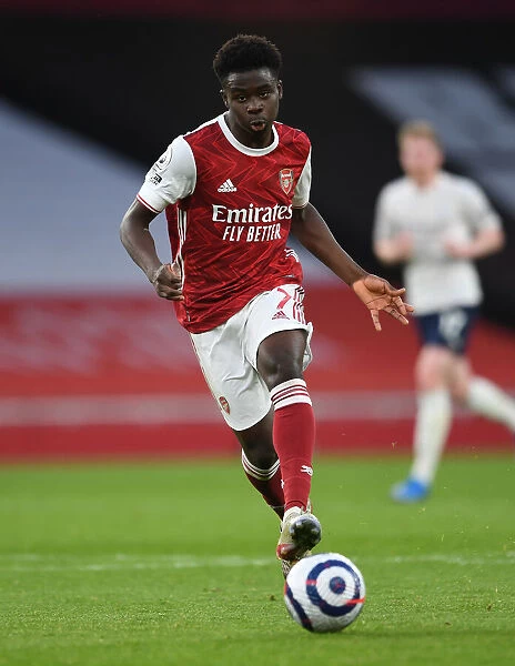 Arsenal's Bukayo Saka in Action: 2020-21 Premier League Match Against Manchester City (Behind Closed Doors)