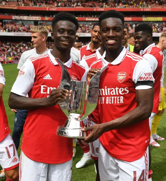 Arsenal's Bukayo Saka and Eddie Nketiah Lift Emirates Cup after Arsenal v Sevilla Pre-Season Friendly