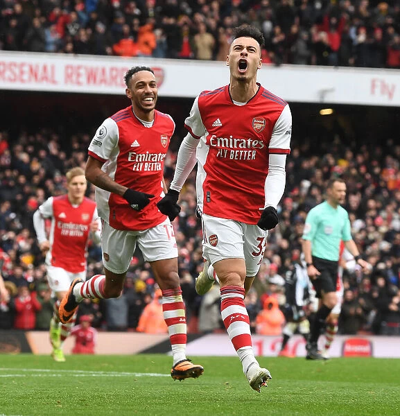 Arsenal's Deadly Duo: Martinelli and Aubameyang Fire Arsenal to 2-1 Victory over Newcastle United (Premier League 2021-22)