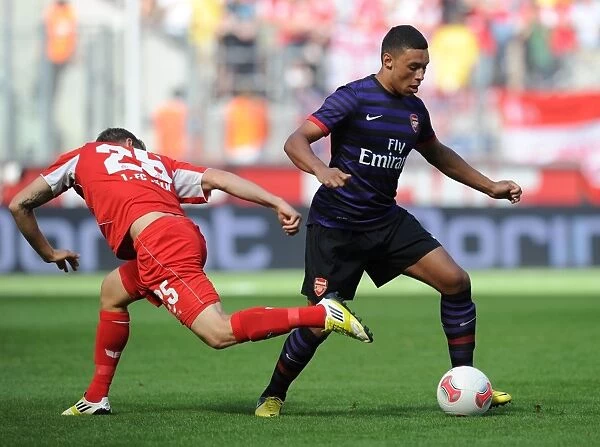 Clash of Talents: Oxlade-Chamberlain vs. Royer in Cologne Pre-Season Friendly