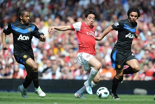 Samir Nasri (Arsenal) Fabio and Anderson (Man United). Arsenal 1: 0 Manchester United