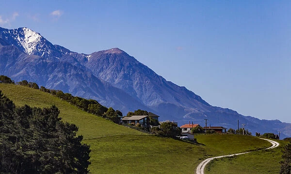 Houses below the mountains at Kaikoura in Canterbury, New Zealand