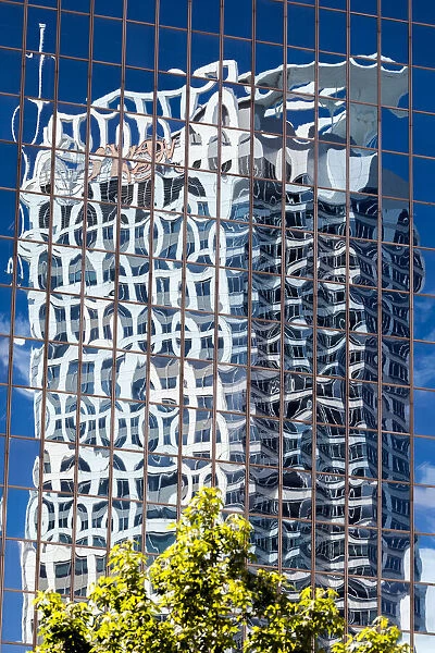Reflections in the windows of an office block in Auckland, New Zealand