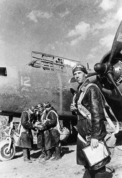 Captain vassili kuzmin, the commander of a squadron of american havoc bombers, taking a last look over his crews before take-off, world war 2