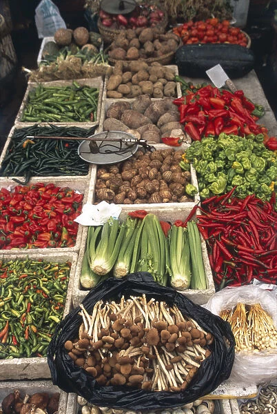 China, assorted fresh vegetables on display in a market stall