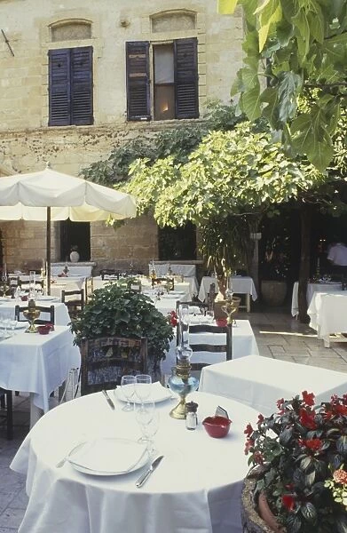 France, Southern France, outdoor tables at restaurant
