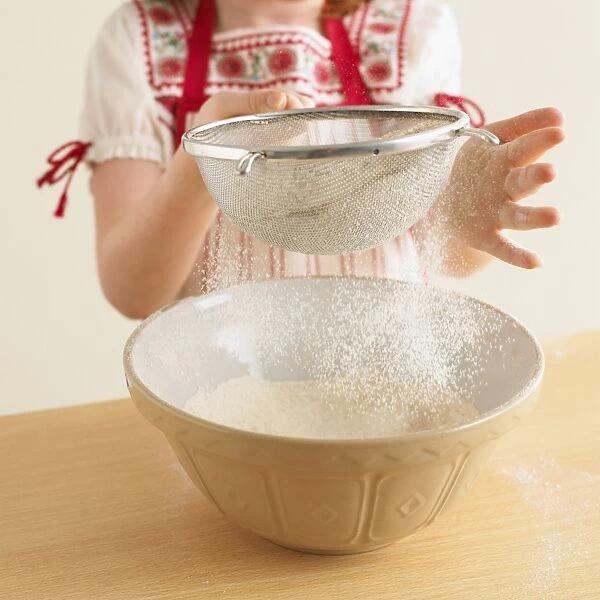 Girl Sieving Flour Into Mixing Bowl Framed Photos Wall Art