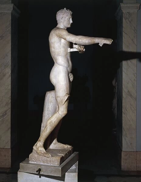 Greek civilization. Apoxyomenos ( scraper ) statue of young Greek athlete cleaning himself with strigile (body-scraper) by Lysippos. Roman copy in marble