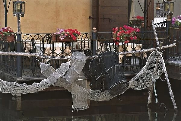 Italy, Emilia-Romagna Region, Comacchio, Po Delta Regional Park, nets for eel fishing hanging outside terrace