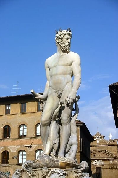 Neptune, Roman gold of the Sea (Greek Poseidon). White marble sculpture on top of