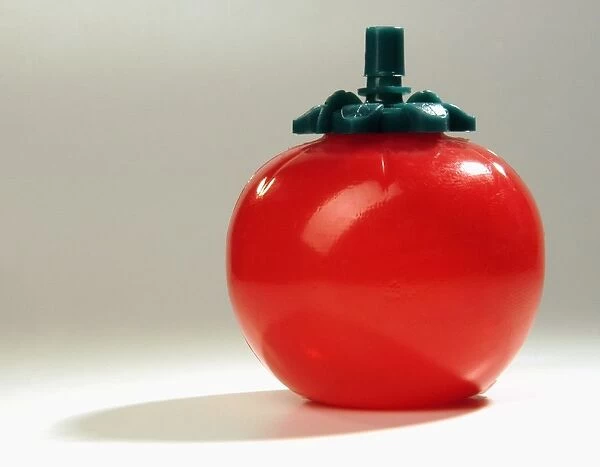Plastic tomato-shaped ketchup dispenser