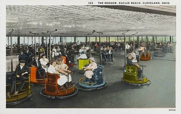 Postcard of the Dodgem. ca. 1921, The Dodgem, Euclid Beach, Cleveland, Ohio. Euclid Beach Park, located on the shore of Lake Erie, eight miles from the public square, is the largest and most popular of the citys amusement parks. It is open free to the public from April until October and contains hundreds of amusement devices also a large athletic field, and a splendid bathing beach. Thousands of schools, lodges, and associations hold annual picnics and reunions here. 123