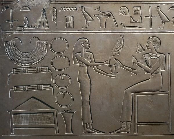 Detail of relief with servant showing jewels to the queen, from Sarcophagus of Queen Kawit, Temple of Mentuhotep II, Deir el Bahari, Egypt