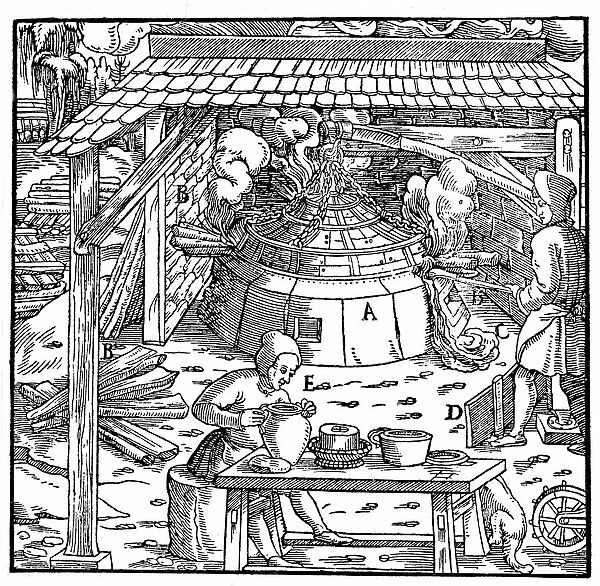 Separating lead from silver or gold in a cupellation furnace. From Agricola (Georg