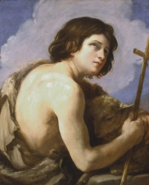 St John the Baptist with his the lamb and a simple wooden cross. Artist Guido Reni (1575-1642)