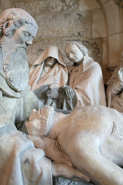 Detail of a statue depicting Christs entombment in Hotel dieu