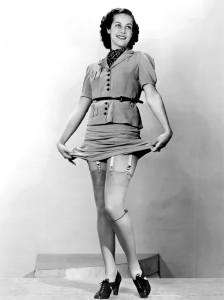 A Woman Displays Her Garters