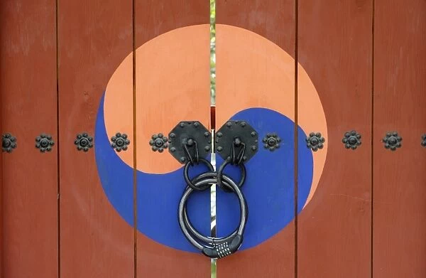 Yin and yang symbols on temple door
