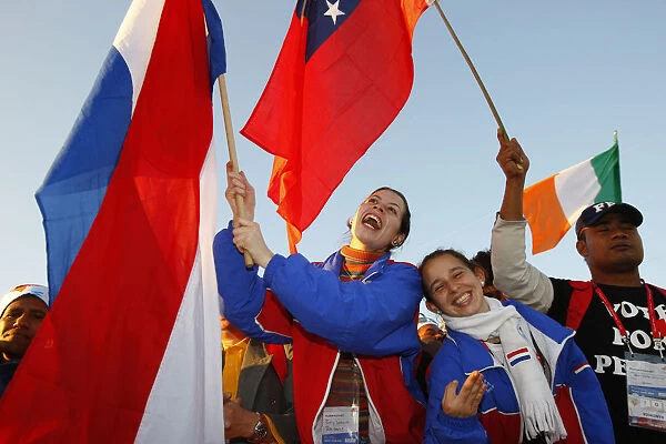 Young Catholics Wave Flags During World Youth Day