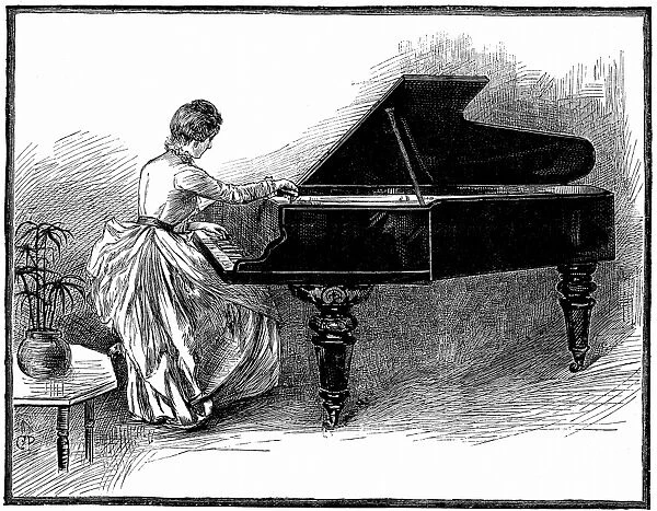 Young woman tuning a grand piano