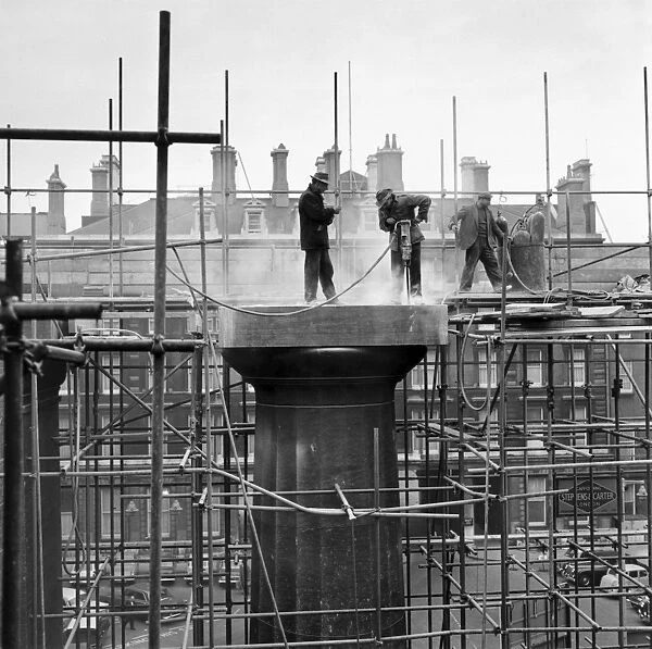 Demolishing the Doric portico at Euston Station, London, 1961
