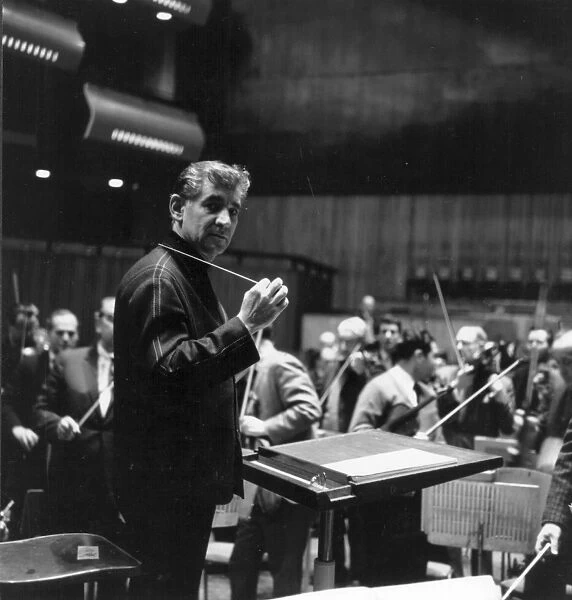 Leonard Bernstein. Composer Leonard Bernstein conducting at London's Royal Festival Hall