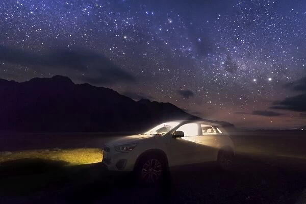 a lid up car in a starry sky For sale as Framed Prints, Photos
