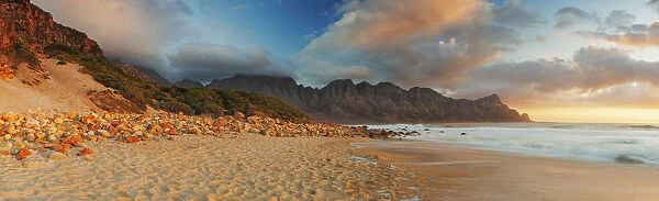 Panoramic Photo of the Bay of Water otherwise known as Kogel Bay with the Kogelberg Mountain Range in the Distance. Western Cape Province, Cape Town, South Africa