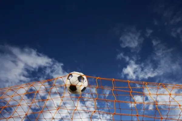 Soccer Ball Going Into Goal Net Print Framed Photos