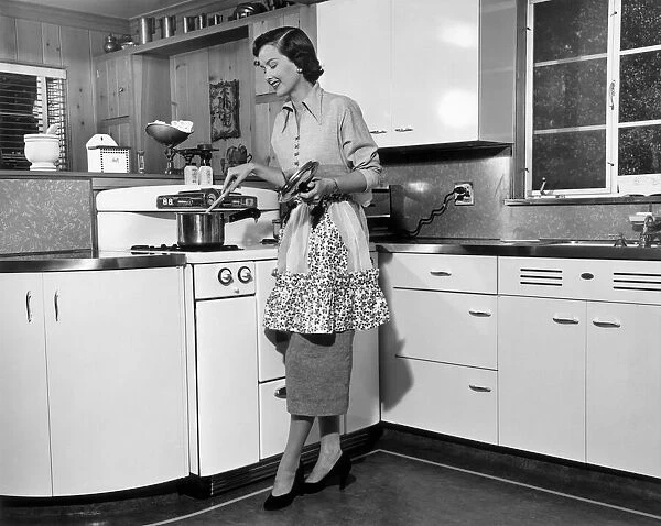https://www.mediastorehouse.com/p/629/woman-stirring-pot-stove-20501961.jpg.webp