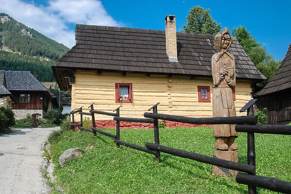 Wooden statue at the entrance to Vlkolinec
