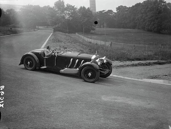 Mrs Roy ( Marjorie ) Eccles making her circuit of the race track. The first woman