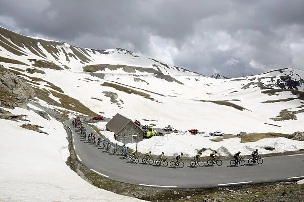 Cycling-Italy-Giro. The peloton rides at the La Bonette pass 