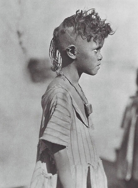 Africa: Bisharin child with amulet (b / w photo)