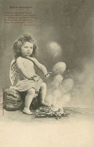 Cherub sitting by a fire (b  /  w photo)