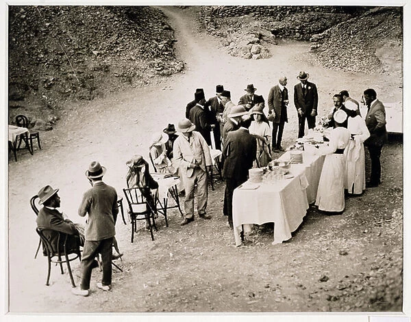 Distinguished visitors taking refreshments near the Tomb of Tutankhamun at the opening of the inner chamber, Valley of the Kings, 18th February 1923 (gelatin silver print)