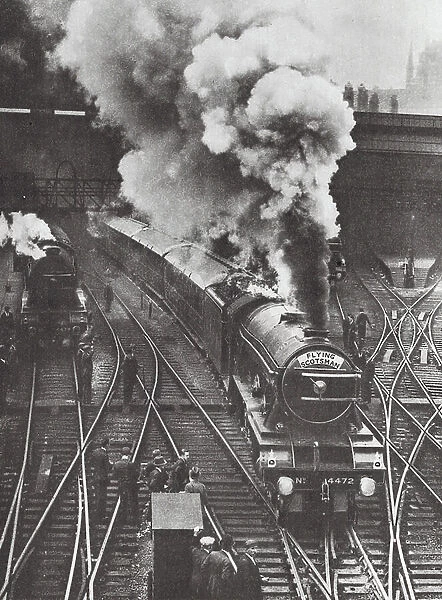 The Flying Scotsman leaving King's Cross Station (b / w photo)