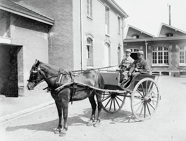France: a horse cart and its driver in a barracks yard, 1900