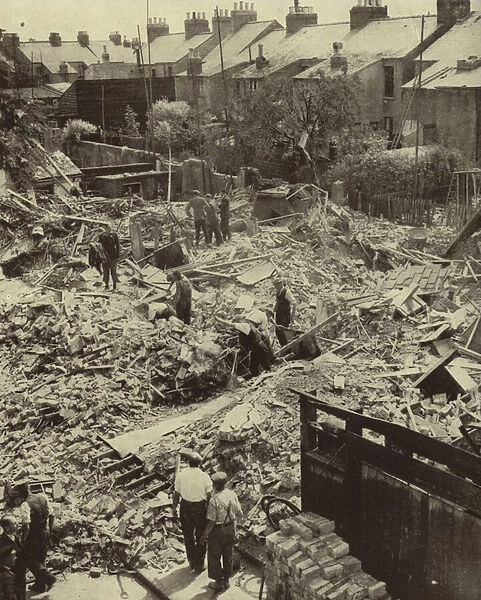 Houses destroyed by a German air raid on Cambridge, World war II, June 1940 (b  /  w photo)