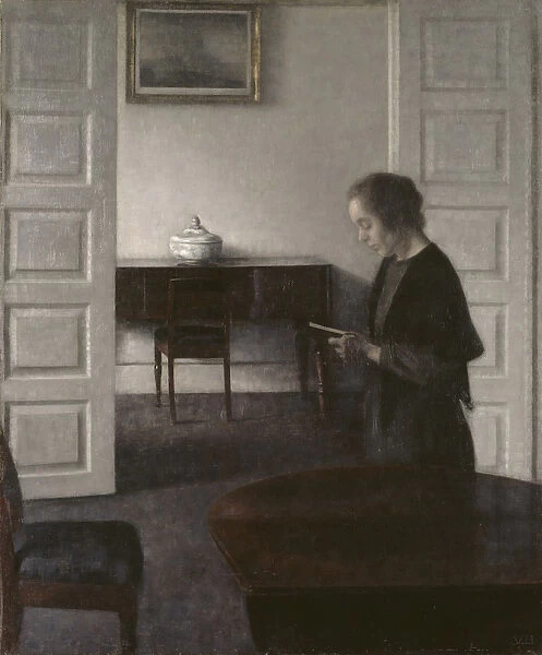 Interior with a Lady Reading, c. 1900 (oil on canvas)