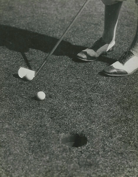 Man playing Golf, 1930-40 (b / w photo)