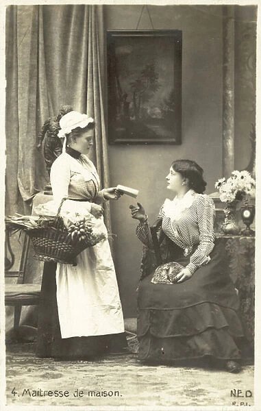 The mistress of the house giving instructions to her maid (b  /  w photo)