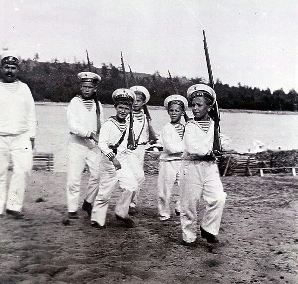 Nagorny accompanies Alexei the Tsarevich as he plays with friends (b / w photo)