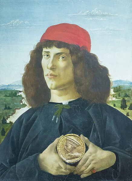 Portrait of a young man holding a medallion of Cosimo de Medici, 1475 circa, (tempera on wood, gilded stucco)