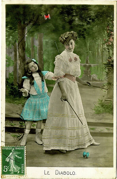 Postcard with mother and daughter playing the diabolo