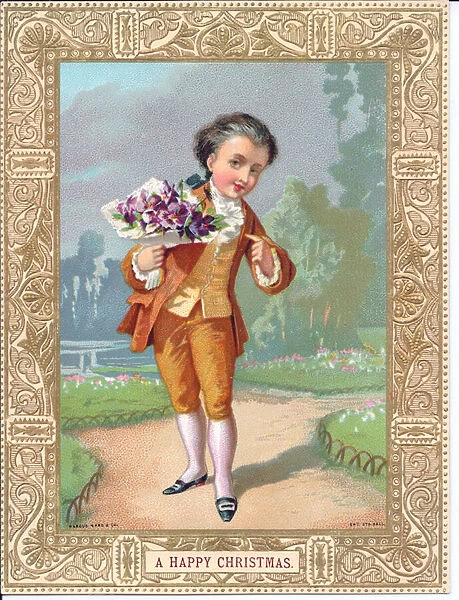 Victorian Christmas card of a young boy dressed in Victorian clothes holding a bouquet of